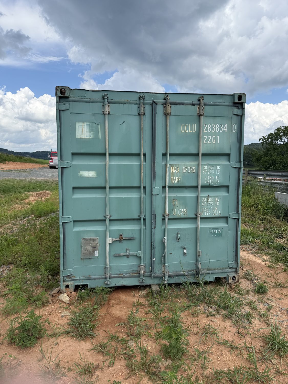 20-foot forest-green shipping container for sale at the Woodlawn, VA yard