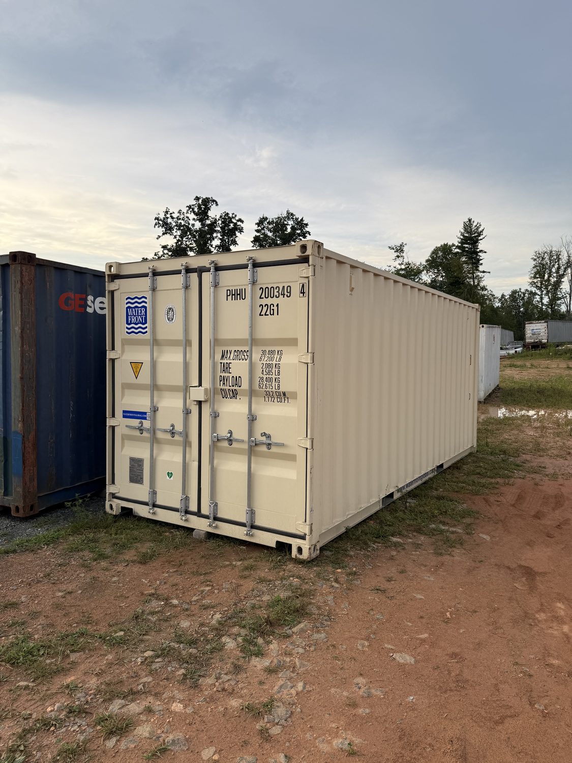 Belongings being loaded into a storage container during a move or recovery
